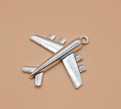 silver_plane_charm